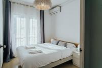 A bed or beds in a room at WELCS VILLA 021 EMP CaZa con piscina privada