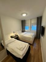 Almnäs Park Hotelにあるベッド