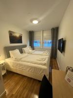 Almnäs Park Hotelにあるベッド