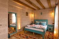Postel nebo postele na pokoji v ubytování Yaren Cappadocia