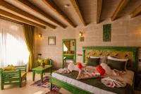 Postel nebo postele na pokoji v ubytování Yaren Cappadocia