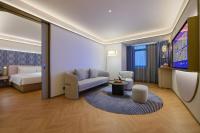 Manxin Hotel Wuhan Hankou Fanhai CBD Xinhua Roadにあるベッド
