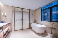 Manxin Hotel Wuhan Hankou Fanhai CBD Xinhua Roadにあるバスルーム