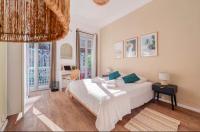 Guest House Chez Bastienにあるベッド
