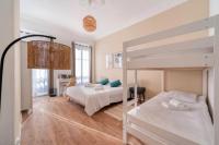 Guest House Chez Bastienにあるベッド