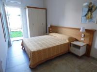 Posteľ alebo postele v izbe v ubytovaní Residence Il Colle