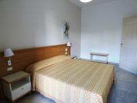 Posteľ alebo postele v izbe v ubytovaní Residence Il Colle