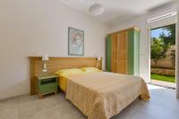 Posteľ alebo postele v izbe v ubytovaní Residence Il Colle