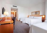 Hotel Zentral Leónにあるベッド