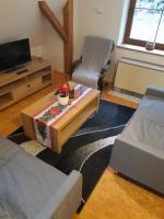 TV a/nebo společenská místnost v ubytování Apartmá Doubek