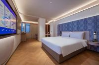 Manxin Hotel Wuhan Hankou Fanhai CBD Xinhua Roadにあるベッド