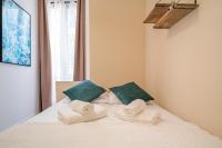 Guest House Chez Bastienにあるベッド