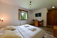 TV a/nebo společenská místnost v ubytování House Flora