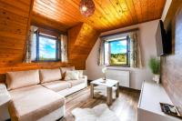 TV a/nebo společenská místnost v ubytování House Flora