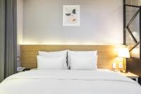 Brown Dot Hotel Angangにあるベッド