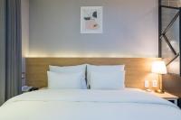 Brown Dot Hotel Angangにあるベッド