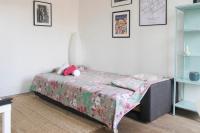 Posteľ alebo postele v izbe v ubytovaní Cozy Apartment at the Gates of Paris