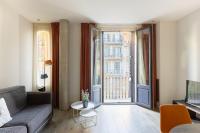 Televízia a/alebo spoločenská miestnosť v ubytovaní Cosmo Apartments Passeig de Gràcia