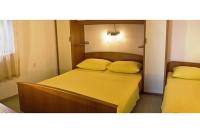 Posteľ alebo postele v izbe v ubytovaní Apartments and Rooms Florijan