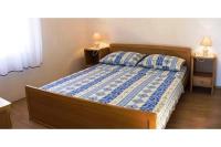 Posteľ alebo postele v izbe v ubytovaní Apartments and Rooms Florijan