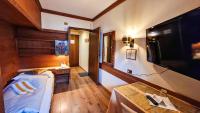 A bed or beds in a room at Solaia Hotel & Guesthouse