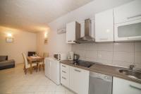 Kuchyňa alebo kuchynka v ubytovaní Apartments Miroslava