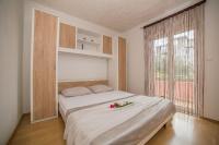 Posteľ alebo postele v izbe v ubytovaní Apartments Miroslava