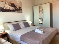 Posteľ alebo postele v izbe v ubytovaní Apartments Miroslava