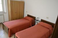 Posteľ alebo postele v izbe v ubytovaní Casa Vacanze Valdamone