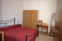 Posteľ alebo postele v izbe v ubytovaní Casa Vacanze Valdamone