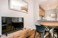 Kuchyňa alebo kuchynka v ubytovaní Riu Nere Mountain Apartments