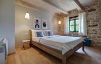 Łóżko lub łóżka w pokoju w obiekcie Holiday Home Ladici Ii