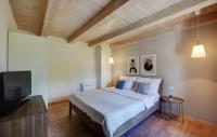 Łóżko lub łóżka w pokoju w obiekcie Holiday Home Ladici Ii