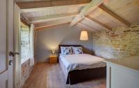 Łóżko lub łóżka w pokoju w obiekcie Holiday Home Ladici Ii
