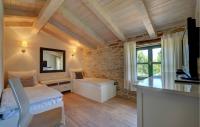 Telewizja i/lub zestaw kina domowego w obiekcie Holiday Home Ladici Ii