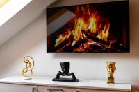 TV a/nebo společenská místnost v ubytování Kingdom River Deluxe