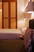 Posteľ alebo postele v izbe v ubytovaní Casa Bassa Hotel