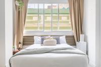 A bed or beds in a room at Studio El Secretario