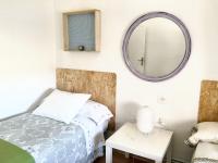 A bed or beds in a room at Charming House in El Poyo del Cid with Garden and Terrace