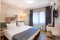 Postel nebo postele na pokoji v ubytování Sim Hotel Istanbul Old City
