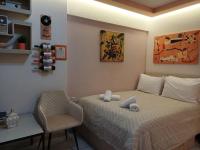 Postel nebo postele na pokoji v ubytování Orange Central Studio Heraklion