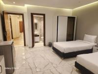 El Mesaadya Hotel فندق المساعديةにあるベッド