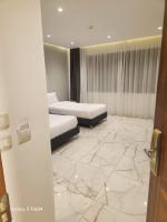 El Mesaadya Hotel فندق المساعديةにあるベッド