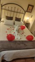 Postel nebo postele na pokoji v ubytování Hotel Baviera