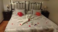 Postel nebo postele na pokoji v ubytování Hotel Baviera