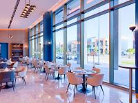 En restaurant eller et andet spisested på Crowne Plaza Al Jubail by IHG
