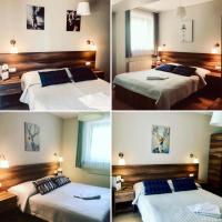 Posteľ alebo postele v izbe v ubytovaní Hotel Victoria