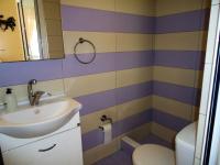 A bathroom at Vacations in Patra Studios