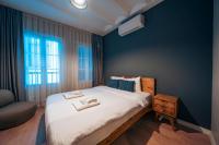 A bed or beds in a room at Kuledibi Suites, Historical 1-bedroom apartment No-2