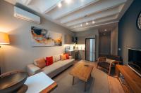 A television and/or entertainment centre at Kuledibi Suites, Historical 1-bedroom apartment No-2